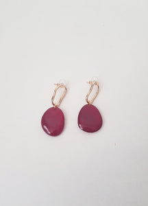 Red Drops on Asymmetric, golden Earrings