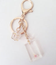 Load image into Gallery viewer, Dried Flowers Transparent Keychain Charm in Gold and Rosé