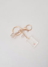 Load image into Gallery viewer, Dried Flowers Transparent Keychain Charm in Gold and Rosé